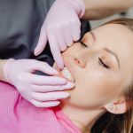 Dentist examining a patient's teeth